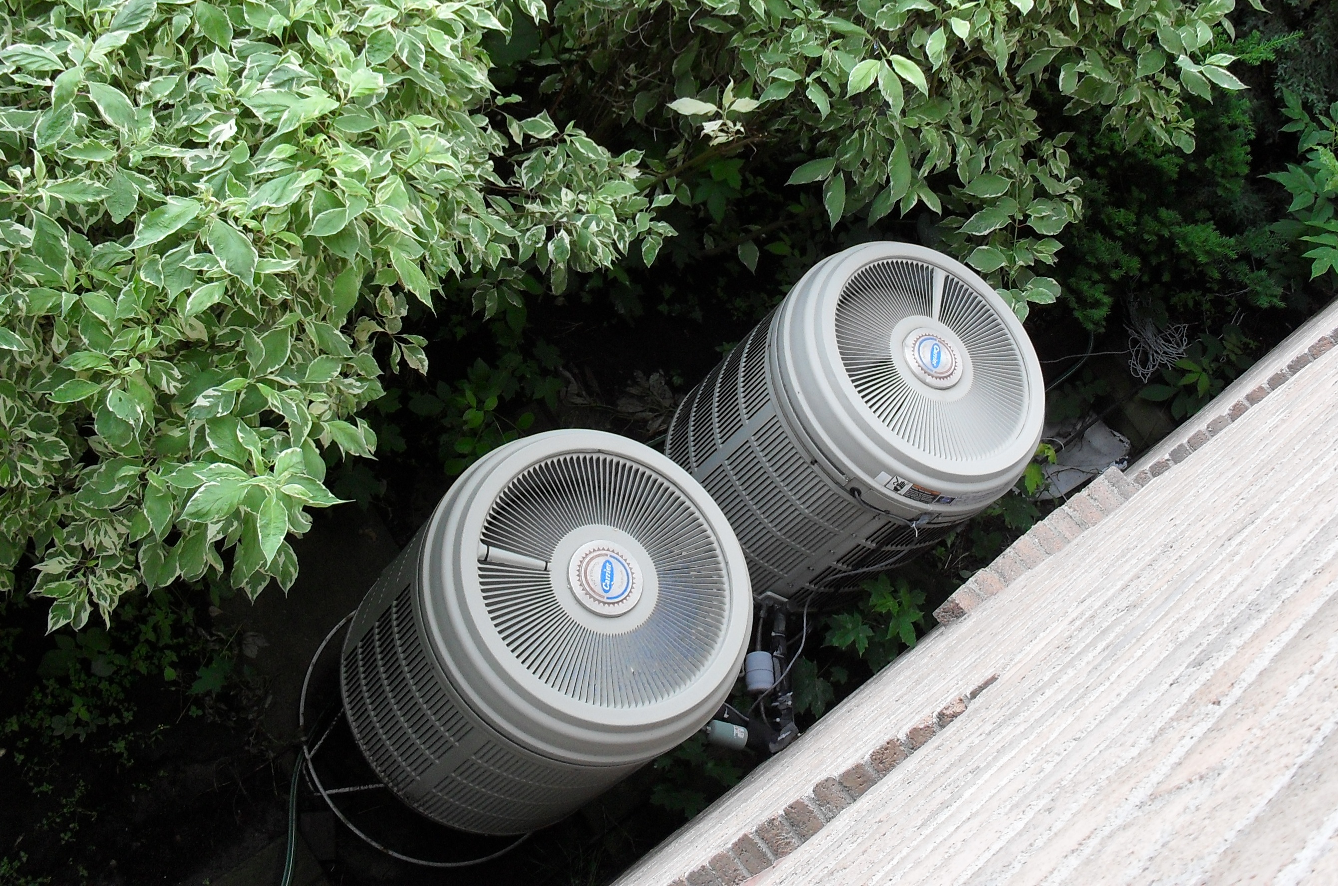 Outdoor heat-pump unit in a June 2010 file photograph by Kristoferb; not a TakeCharge-funded installation.